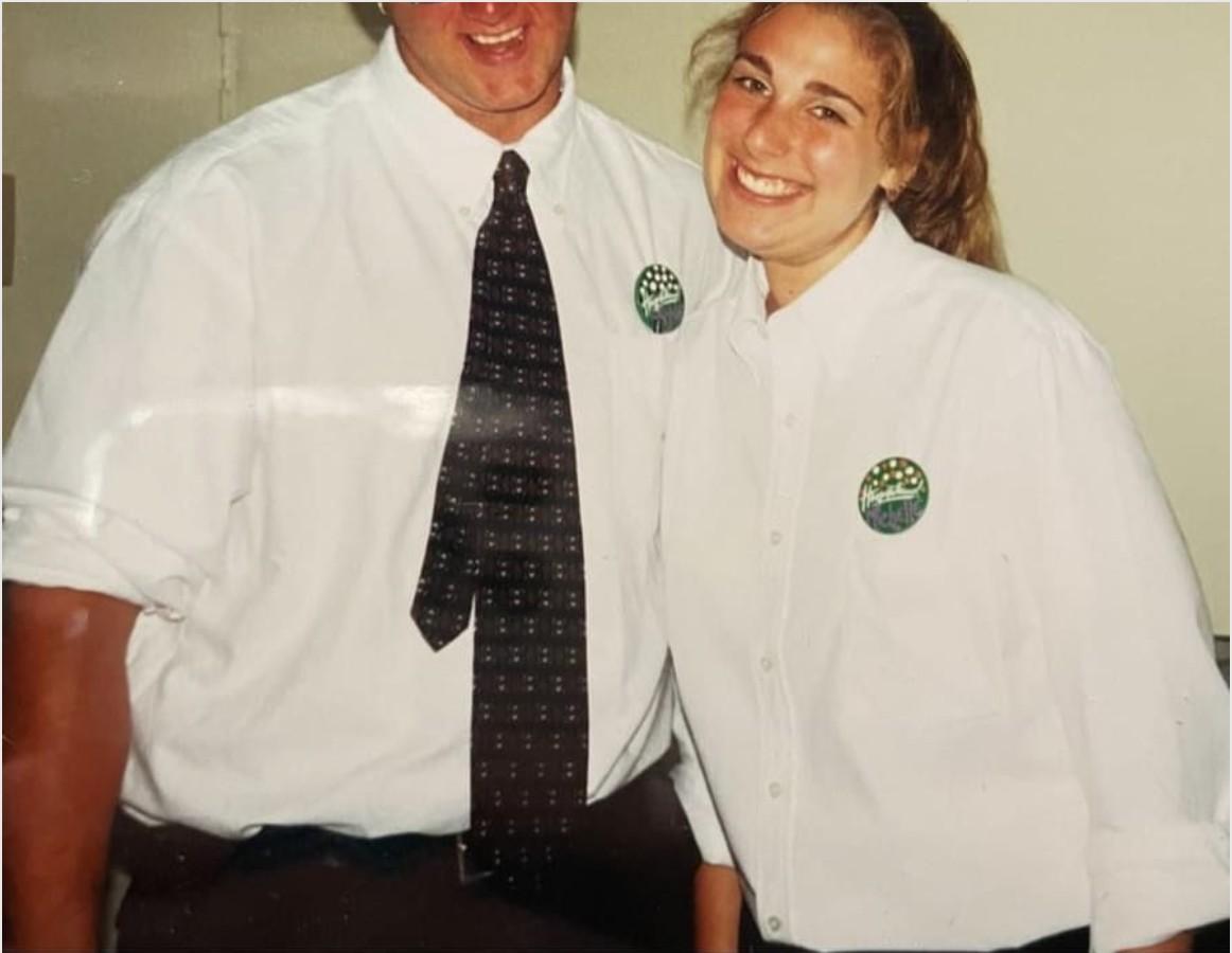 Wayne Partello and his friend Michelle waiting tables at Olive Garden, wearing name-tag pins.