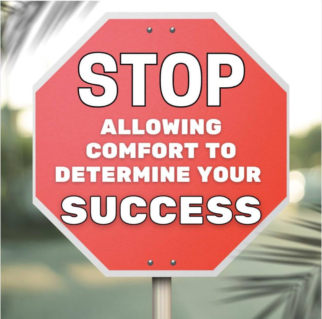 Stop sign graphic reading 'STOP allowing comfort to determine your SUCCESS'.
