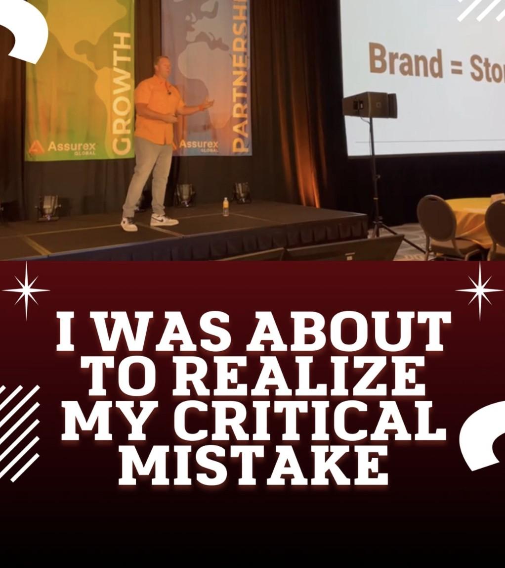 Wayne Partello speaking on stage at a conference, above text reading "I was about to realize my critical mistake."