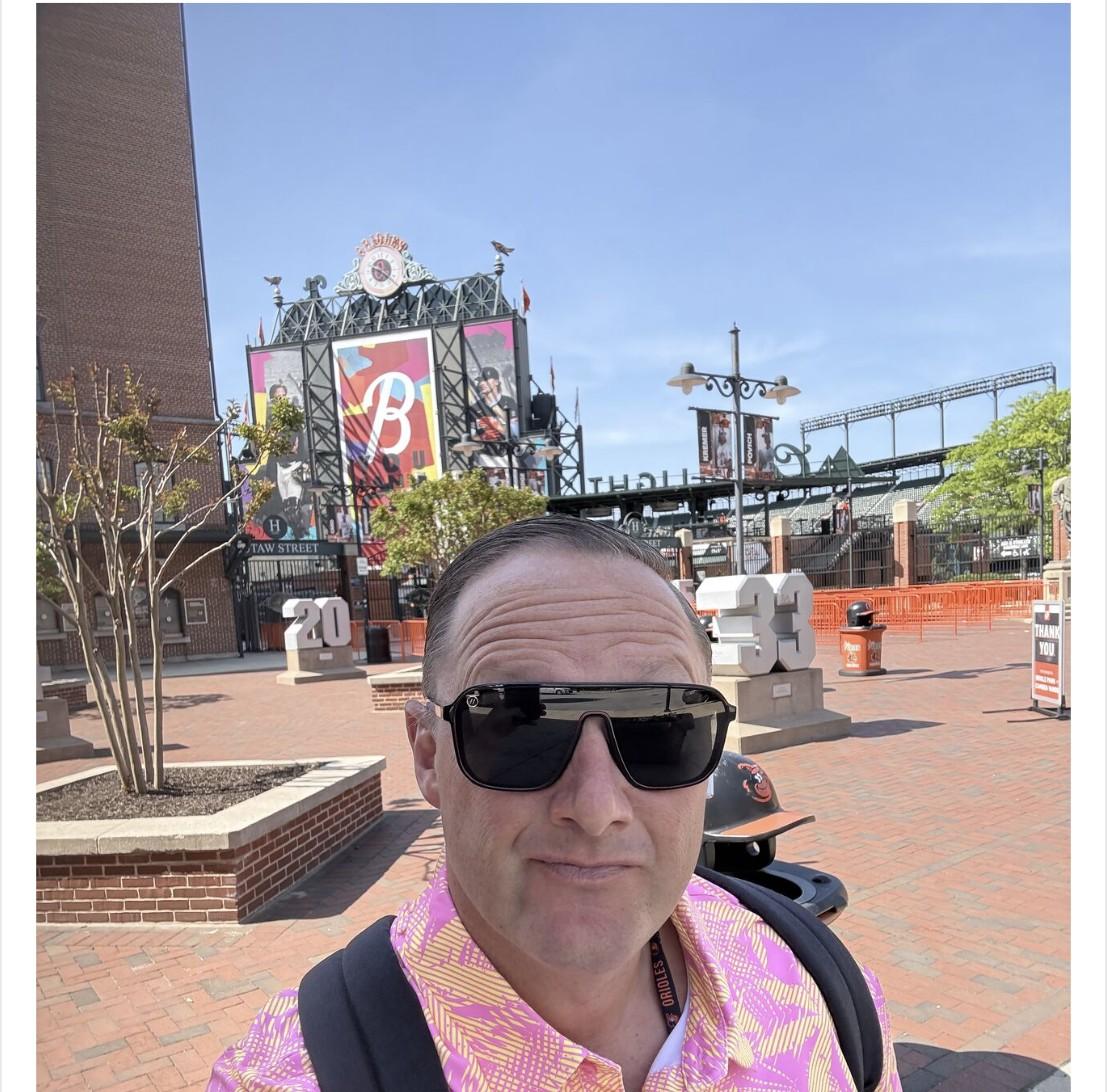 Wayne Partello taking a selfie outside Camden Yards, the Baltimore Orioles' stadium